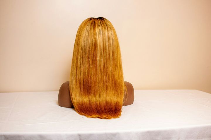 Long soft waves in honey blonde